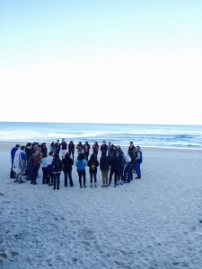 The group praying Shacharit Noam-style on the beach of Bat Yam.